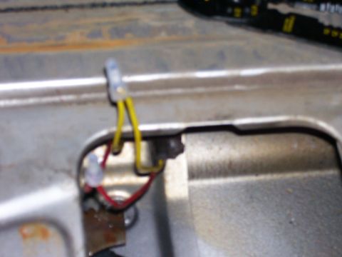 1984 Ford Bronco - A close-up view of a wiring harness clip and wires, with a Supermotors.net watermark.