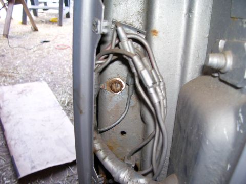 1984 Ford Bronco - Vehicle wiring harness and mounting bracket detail.