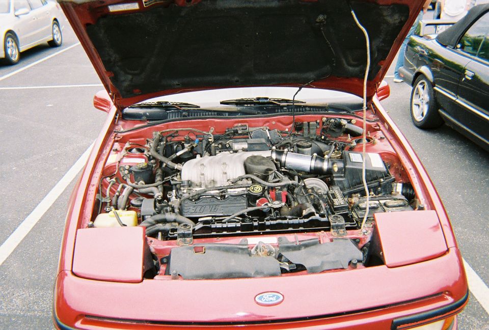 1991 Ford Probe engine bay with V6 engine visible