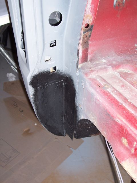 1978 Ford Bronco - Close-up of a vehicle's body panel undergoing repair or restoration.