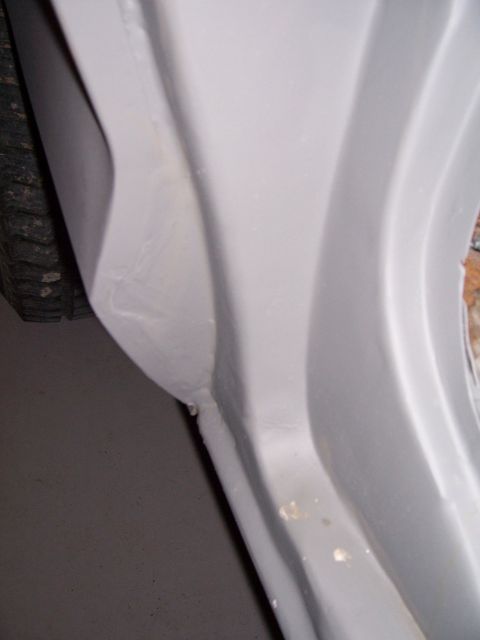 1978 Ford Bronco - Close-up of the wheel well and fender seam on a 1978 Ford Bronco.