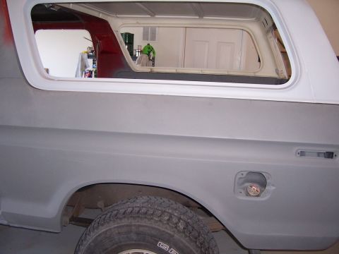 1978 Ford Bronco - 1978 Ford Bronco bodywork in progress, showing the rear quarter panel and window frame.