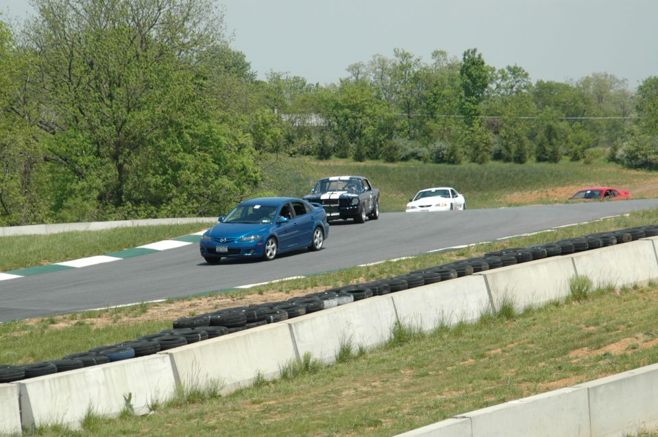 1993 Ford Mustang on race track, 3q-front view