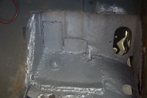 1994 Ford Bronco - Vehicle undercarriage after rust treatment and coating application.