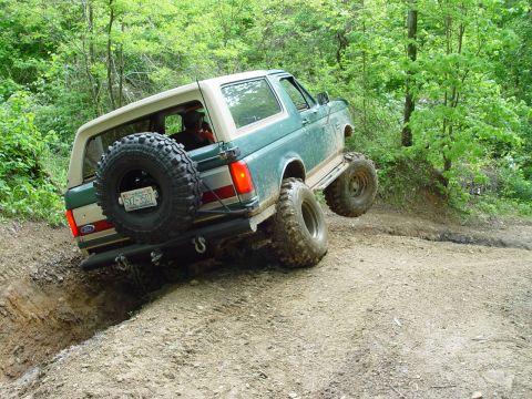 1996 Ford Bronco - This 1996 Ford Bronco navigates a challenging off-road trail, its capabilities.