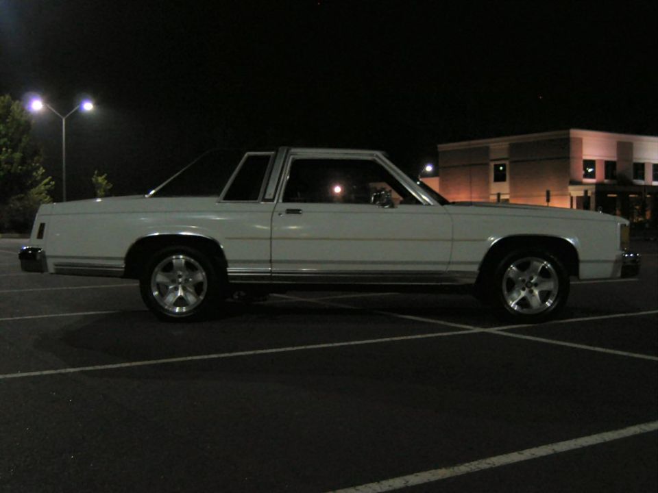 1985 Ford Crown Victoria LTD two-door sedan parked at night