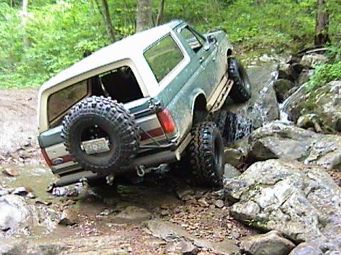1996 Ford Bronco - This Ford Bronco navigates a rocky stream bed during an off-road excursion.