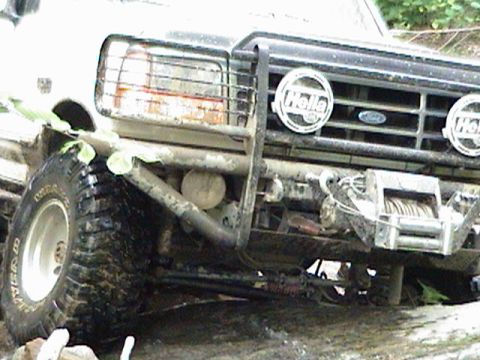 1996 Ford Bronco - Front view of a 1996 Ford Bronco equipped with a winch and auxiliary lighting.