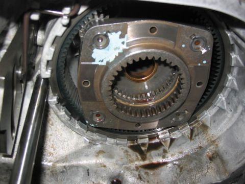 1995 Ford Bronco - Internal view of a vehicle's transfer case, showing gears and lubrication.