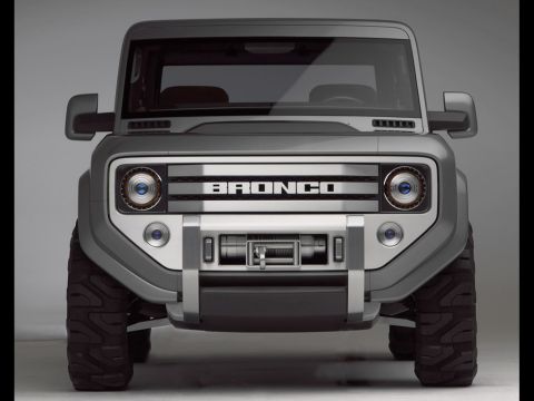 1996 Ford Bronco - This SUV features prominent Bronco badging on its front grille and a winch mounted on the bumper.