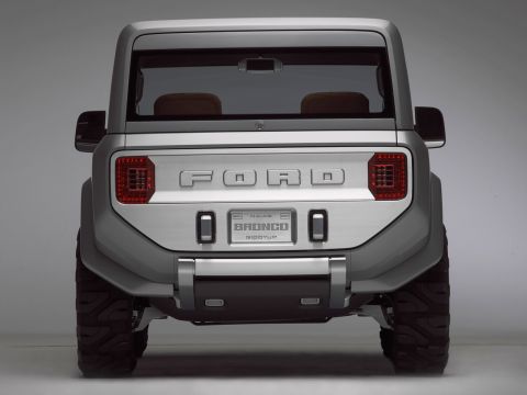 1996 Ford Bronco - Concept Ford Bronco SUV's rear end shows 'BRONCO' and 'BIGGUP' badging.