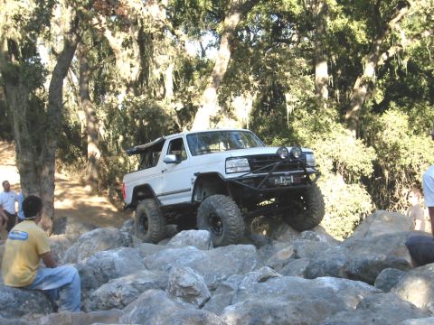 1996 Ford Bronco - This modified 1996 Ford Bronco tackles a challenging rocky terrain.