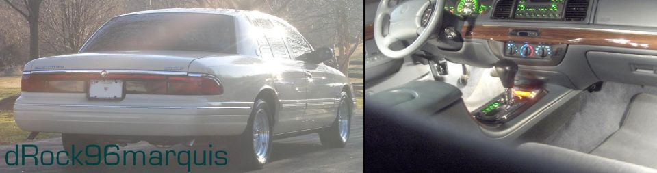 Silver sedan rear 3/4 view beside interior console with shifter and woodgrain trim