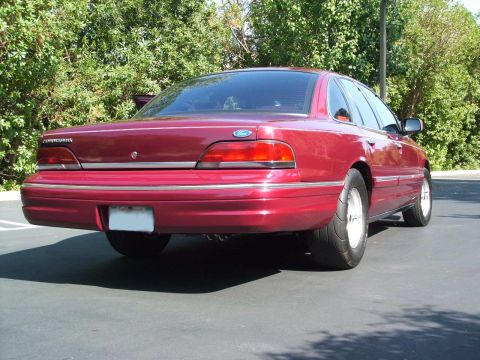 1992 Ford Crown Victoria - Rear view of a 1992 Ford Crown Victoria with drag tires on the back wheels.