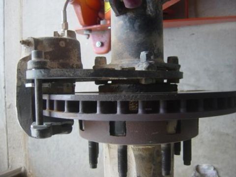 1994 Ford Bronco - Butlers Dodge rotor swap using GLO brackets. Gives more leaf srping clearance, but not the way i would wnt to do it for a street and trail…