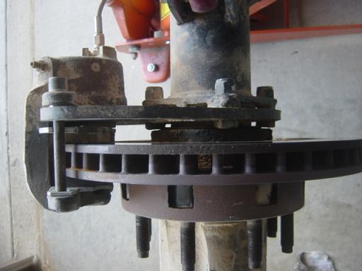 Butlers Dodge rotor swap using GLO brackets.  Gives more leaf srping clearance, but not the way i would wnt to do it for a street and trail rig.