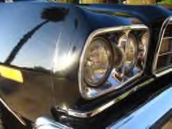 1972 Ford Ranchero - Close-up of the front end of a 1972 Ford Ranchero, highlighting the grille and headlight assembly.