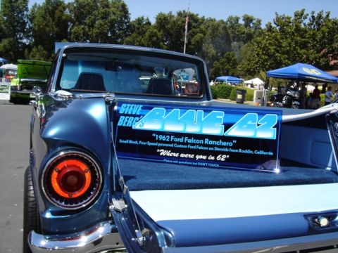 1972 Ford Ranchero - A blue 1962 Ford Falcon Ranchero is displayed with a sign detailing its custom features and origin.