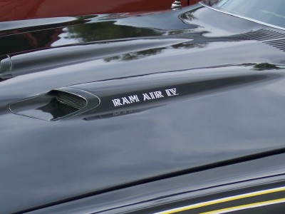 1972 Ford Ranchero - Close-up of a car hood a Ram Air IV scoop and racing stripes.