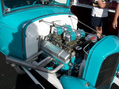 1972 Ford Ranchero - Close-up of a custom V8 engine with dual carburetors and prominent "Rocket" valve covers.