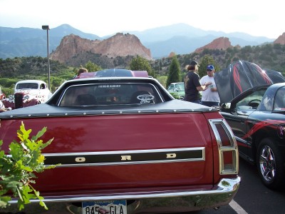 1972 Ford Ranchero - Rear view of a red 1972 Ford Ranchero parked with other vehicles at Garden of the Gods.