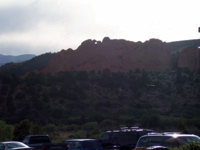1972 Ford Ranchero - A scenic view of red rock formations with a parking lot full of vehicles below.