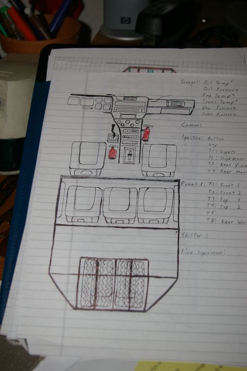 1986 Ford Bronco - Amateur hand-drawn notebook concept sketch of a custom dashboard, gauges, and seating layout; not a manufacturer technical document.