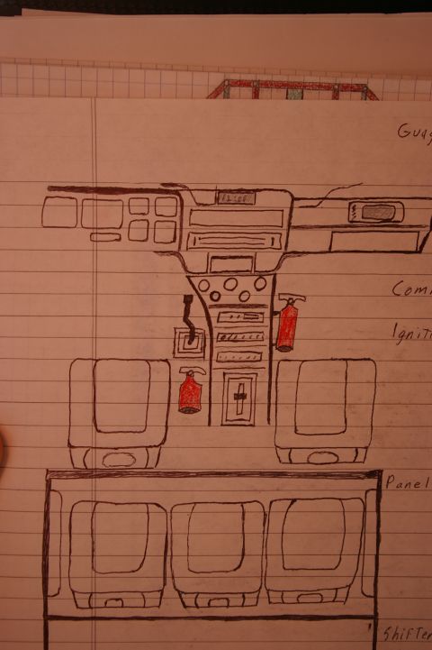 1986 Ford Bronco - Amateur hand-drawn notebook concept sketch of a custom dashboard, gauges, and seating layout; not a manufacturer technical document.