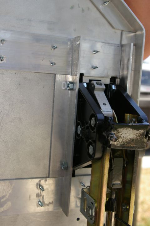 1986 Ford Bronco - Close-up view of an interior console mechanism, aluminum paneling and various mechanical components.