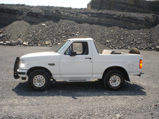 White 1995 Ford Bronco, side view, removable top