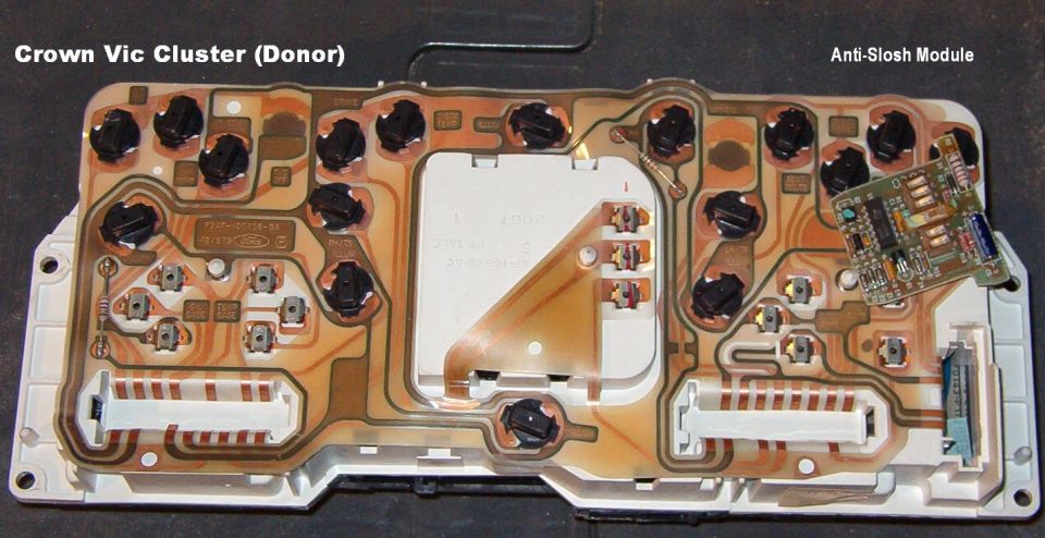 Removing the module is simple - just press the lock in the center & slide it straight out.  The wiper contacts on the PC board touch the bare copper traces on the flap of the film circuit that goes inside the slot.
IF THE IMAGE IS TOO SMALL, click it.

See the NEXT several captions...
