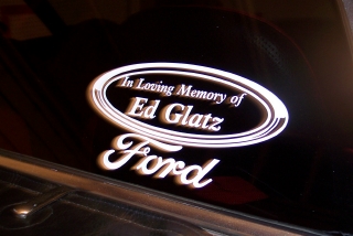 1972 Ford Ranchero - A sticker commemorating Ed Glatz is affixed to a dark surface, likely a vehicle window.