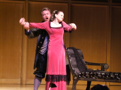1996 Ford Probe - A dramatic scene unfolds on stage as actors in elaborate costumes perform.