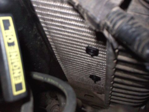 1995 Mercury Sable - Plastic clips hold it onto the radiator. They should hold according to the mechanic.