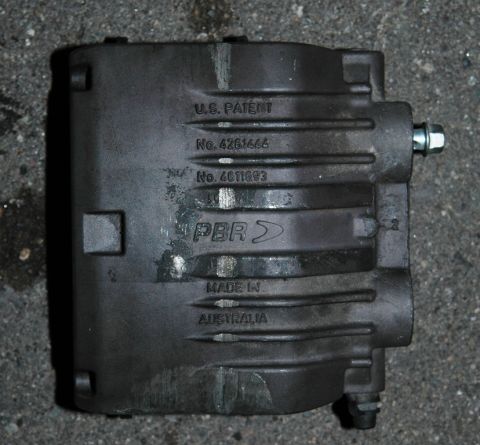 1991 Ford Taurus - This is a PBR brake caliper, manufactured in Australia, showing patent and part numbers.