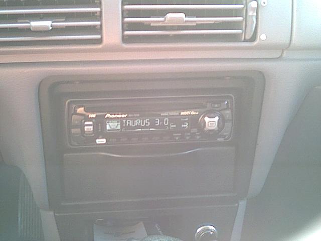 Pioneer car stereo in dash displaying TAURUS 3.0