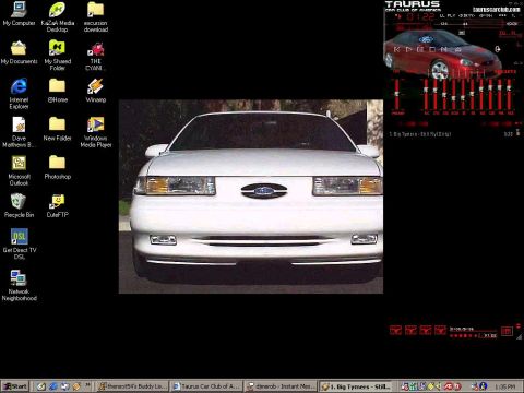 1993 Ford Taurus - The front of a white sedan is displayed on a computer desktop.