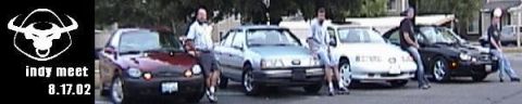 1993 Ford Taurus - Several cars and individuals gathered for an outdoor event, as indicated by the text 'indy meet 8.17.02'.