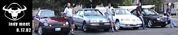 Banner photo of four sedans at a car meet with men and 'indy meet 8.17.02' text