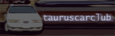 1993 Ford Taurus - Front view of a 1993 Ford Taurus, with 'tauruscarclub' text superimposed.