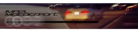 1993 Ford Taurus - Motion blur captures a car's rear view at night, with 'IMPEL MOTORSPORT' branding on the left.