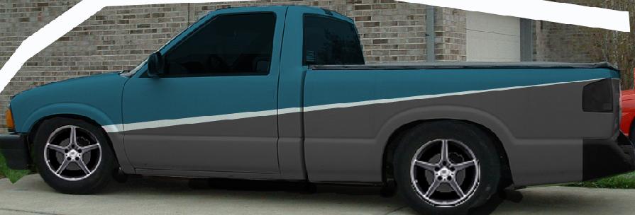 Side view of lowered teal and gray regular-cab pickup with chrome wheels
