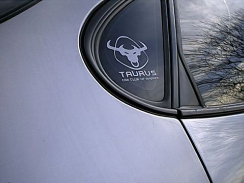 1998 Ford Taurus - Another TCCA sticker pic. This is on the side window of the passenger side. 3/14/02