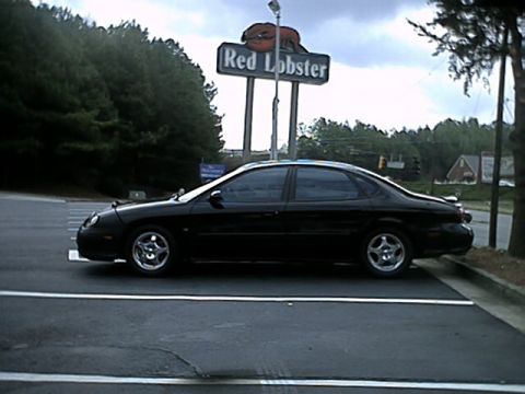1998 Ford Taurus - Black SHO spotted around town. 3/17/02