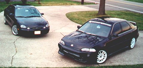 1998 Ford Taurus - Picture of Eric's Taurus with his friend's Civic