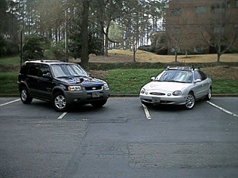 1998 Ford Taurus - Pic of my taurus and my wife's Escape. 3/18/02