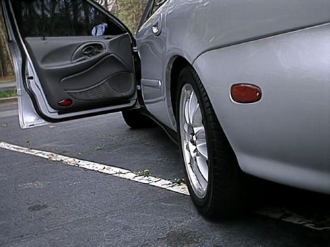 1998 Ford Taurus - Pic down the driver's side. 3/18/02