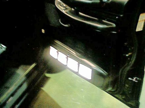 1998 Ford Taurus - Interior view of a car, highlighting four illuminated vents on the dashboard.