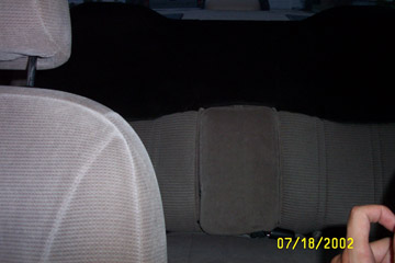 1993 Ford Taurus - New (old?) rear seat, custom painted, with folding armrest and elevated headrests.