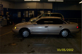 1993 Ford Taurus - Into the shop with hubcaps...
